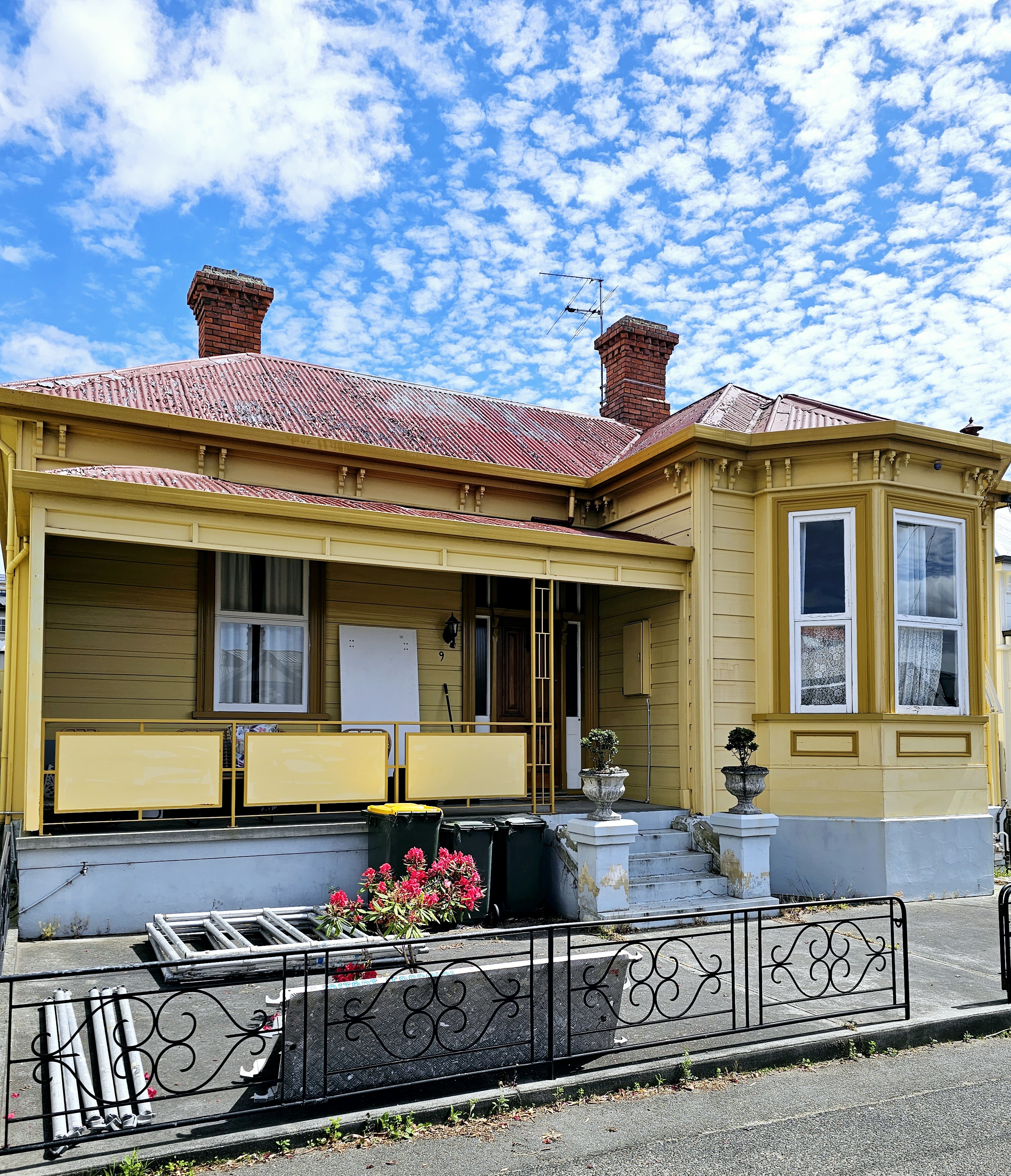 Restored weatherboard home on Yardley Street Hobart featuring a Monument roof and modern exterior repaint by Wolfe’s Painting.